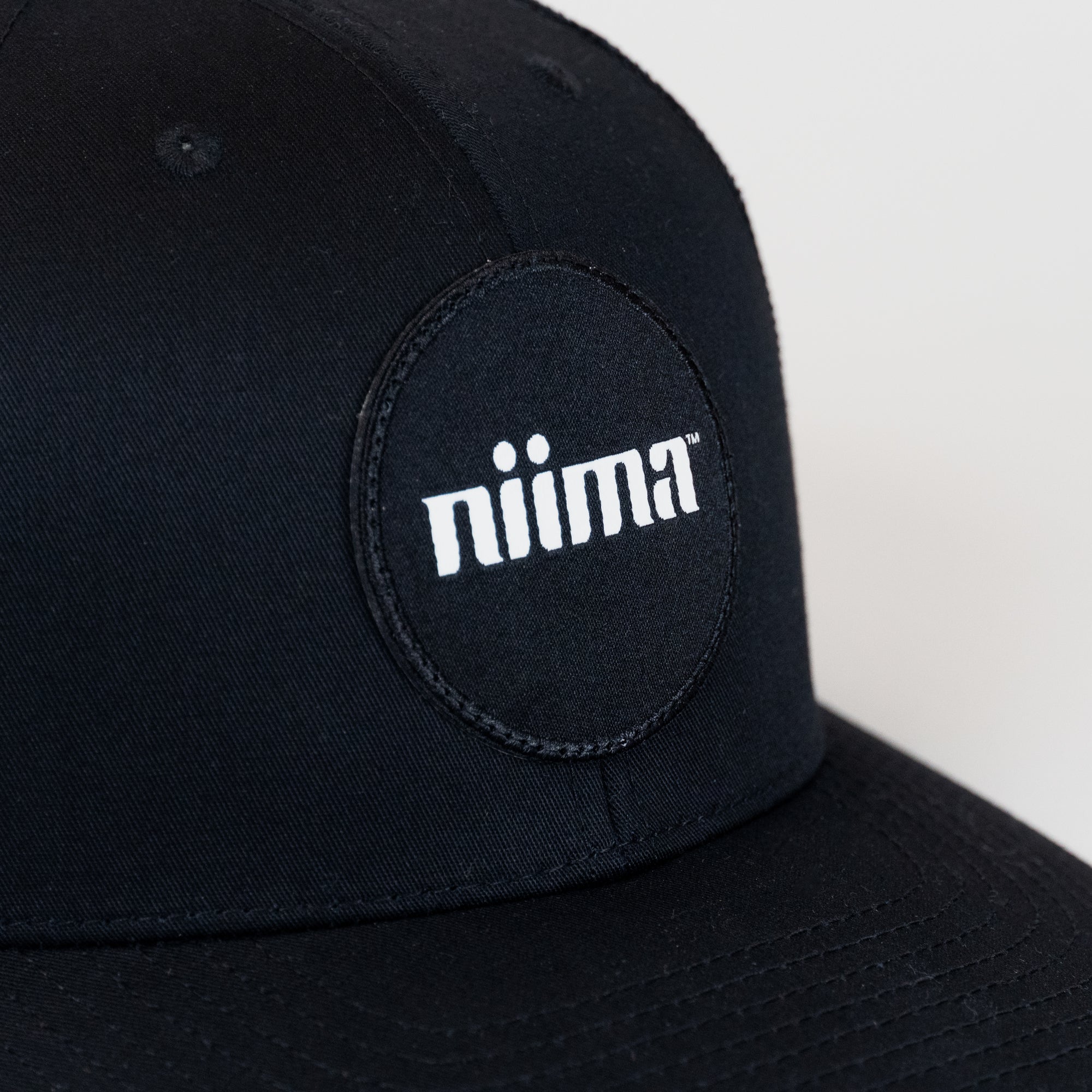 Niima Trucker Hat in Black - Niima™ Radically Simple Wellness | Daily whole  foods nutrition supplement